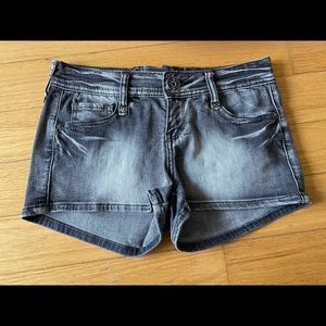 Guess denim shorts with lace-up at back.